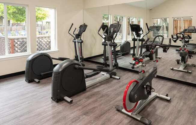 fitness center with eliptical bikes