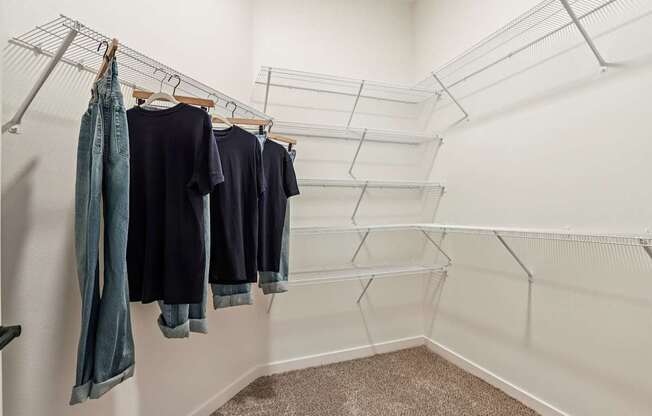 Clothes hanging on a clothesline in a room.