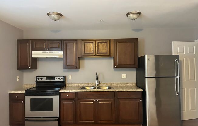 Finished Basement! Rear Parking Pad! Central Air! Available Now!