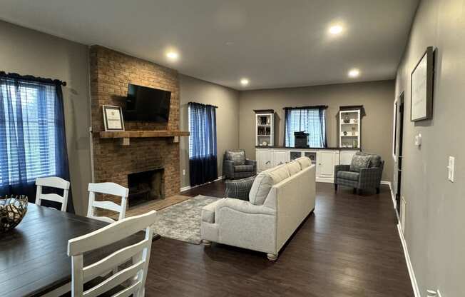 a living room with a couch and a table