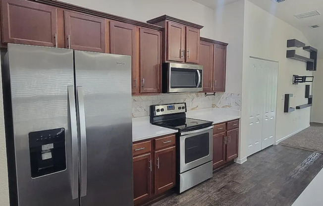 Charming 3/2 in a prime location with multiple upgrades including attache garage and screened in lanai