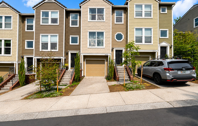 Spacious 3-Bedroom Forest Heights Townhome with Dual Primary Suites, Ground-Level Bedroom, Private Backyard & Wooded Views