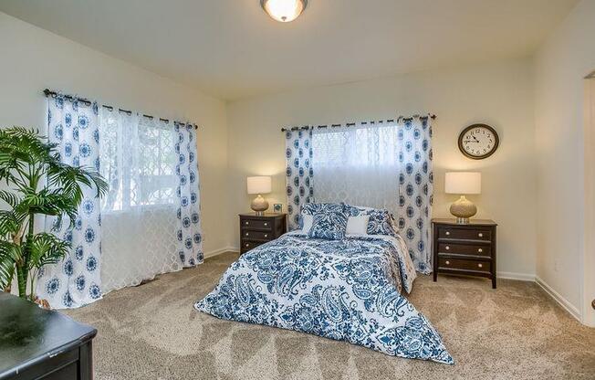 Ridgewood Bedroom with Carpet and Large Windows