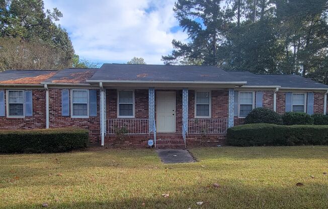 Spacious ranch with large back yard and screened in rear porch