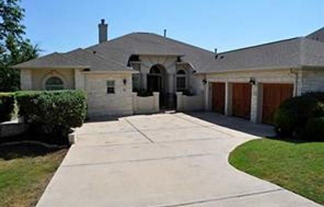 BEAUTIFUL CUSTOM ONE STORY HOME WITH WROUGHT IRON GATE COURTYARD ENTRY.