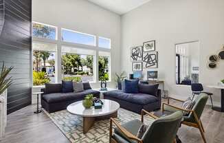 Community Clubhouse with Lounge Furniture and TV at Monterra Apartments located in Las Vegas, NV.