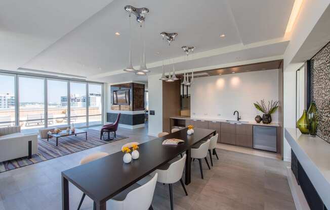 a kitchen and dining area in a 555 waverly unit