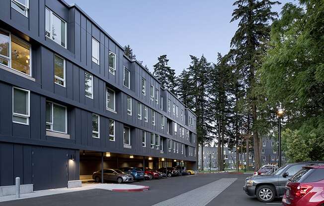 a building with a parking lot in front of it