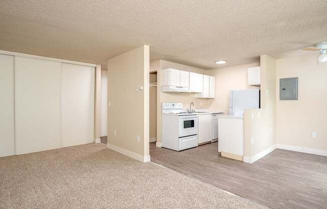 Sunset Apartments | Living Area + Balcony