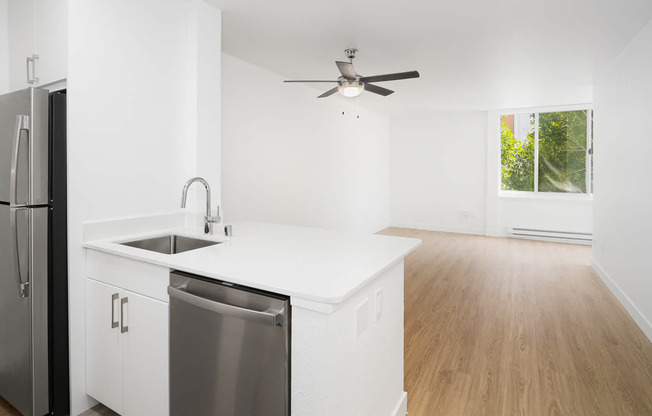 Kitchen with Stainless Steel Appliances and Hard Surface Flooring