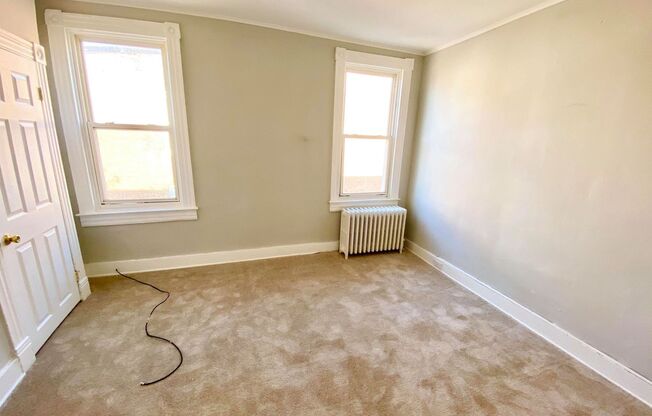 For Rent: Classic Elegance at 2504 N Calvert St – Your Timeless Urban Retreat!