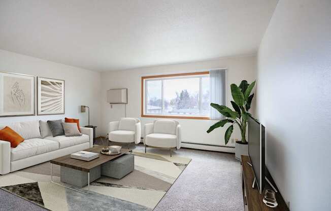 A living room with a white couch, two chairs, a coffee table, and a television. West Fargo, ND Saddlebrook Apartments