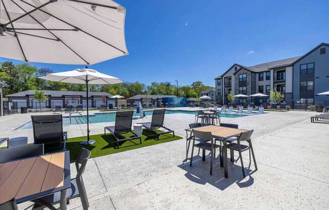 Poolside Relaxing Chairs at Evolve at Parkway Apartment Homes, Concord, NC