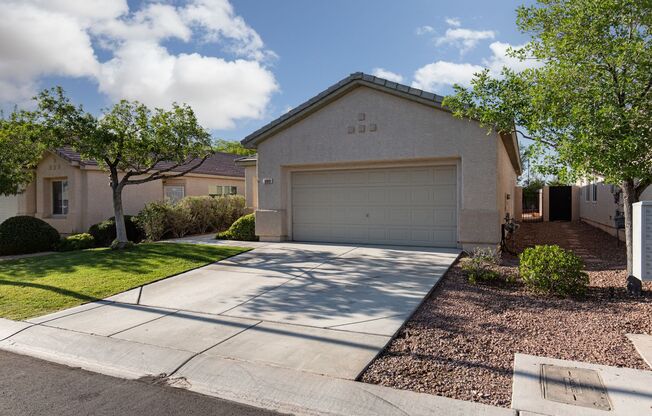Wonderful Summerlin single story with grass backyard and island kitchen.