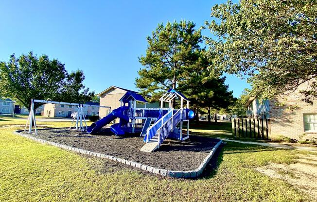 Play area at The Retreat @ St. Andrews Apartments by ICER, Columbia