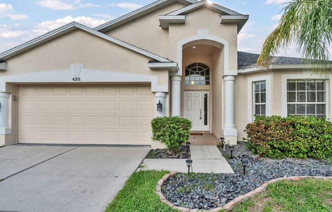 Stunning 4-Bedroom Home with Fenced Yard in Exclusive Whinsenton Place, Wesley Chapel