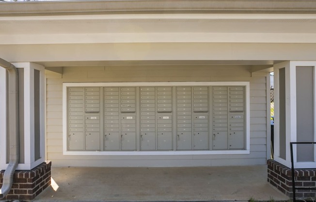 a view of the mailboxes on the side of a building