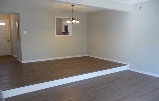Fully updated townhome located walking distance to shops and close to interstates!