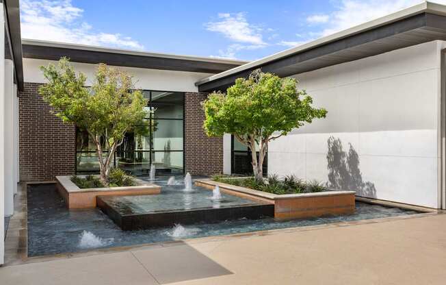 A modern house with a pool in the backyard.