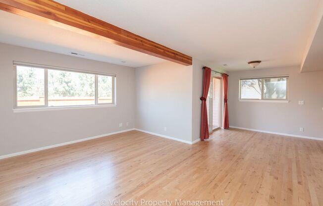 Move in Deposit Reduced! Beautiful Townhome with new paint, carpet and refinished hardwood floors!