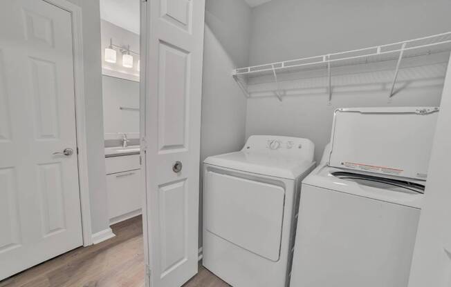 A laundry room with a washer and dryer.