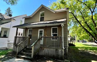 1057 Lincoln NW- Water included, Garage, Fenced yard