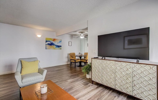our apartments have a living room and dining room with a flat screen tv