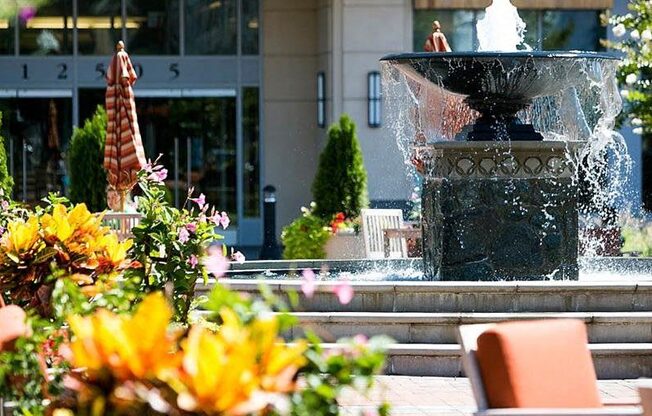 a water fountain in front of a building