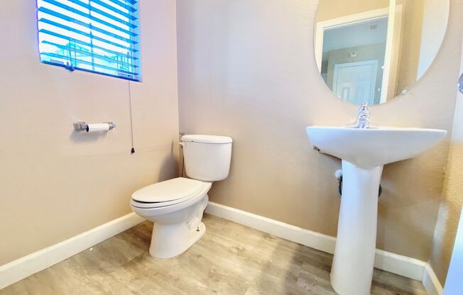 STUNNING 2 STORY HOME 3 BEDROOM 2.5 BATH W/ ONE CAR GARAGE IN A GATED COMMUNITY!