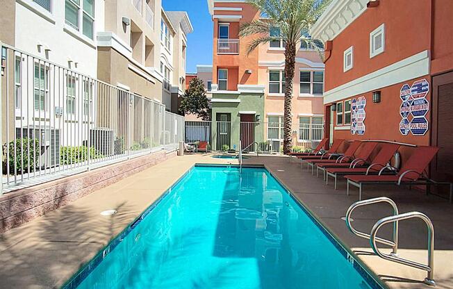 Large sparkling lap pool for enjoyment at The Croix Townhomes in Henderson, NV offers 2 and 3 bedroom Townhomes!