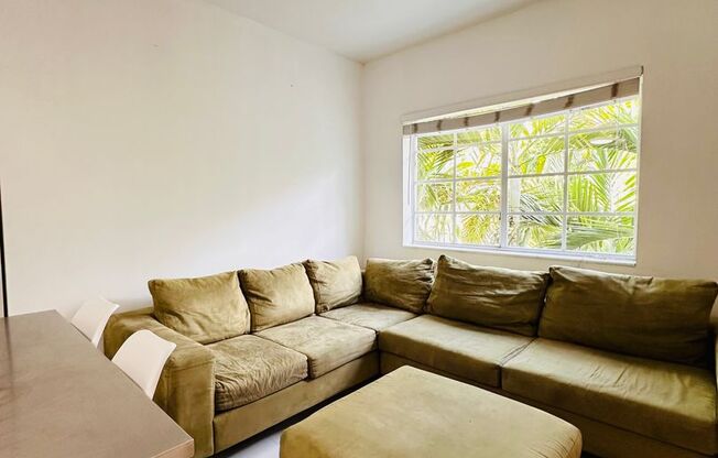 Bright and furnished 1/1 in classy remodeled Art Deco Building