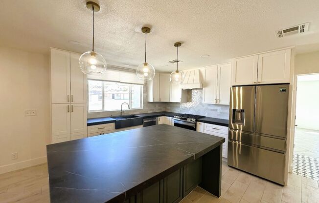 Beautiful renovated single story Henderson home on a Cul-De-Sac! Very close to I-11! Huge lot with a big backyard! Home is located across from O'Callaghan Park featuring: tennis courts, beach volleyball, baseball field, 2 parks, dog park and walking trail