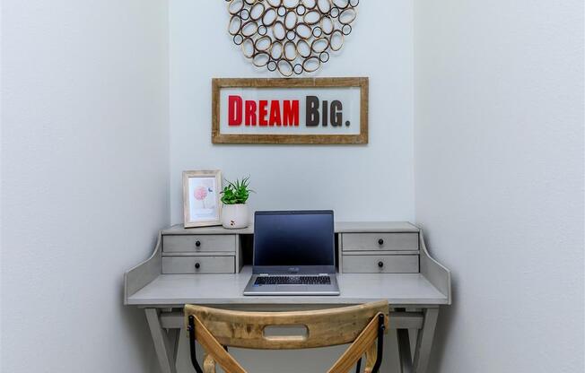 a desk with a laptop and a chair in a room at Jefferson Yards, Tacoma, WA 98402