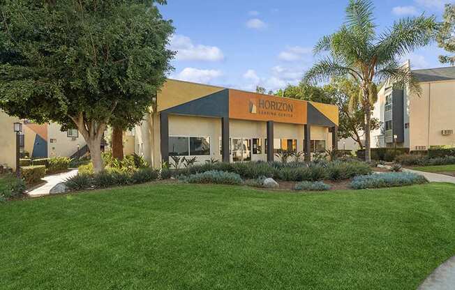 Exterior Community Building and Landscape at Horizon Apartments located in Santa Ana, CA.