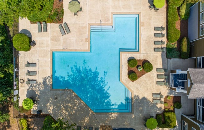 arial view of a pool in a backyard
