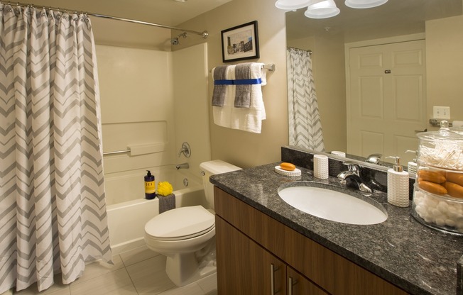 Renovated Bathrooms With Granite Countertops and Vanities With Lots of Storage Space