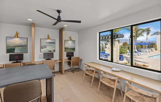 a living room with a table and chairs and a large window at Westbury Apartments, Rancho Cucamonga, 91739