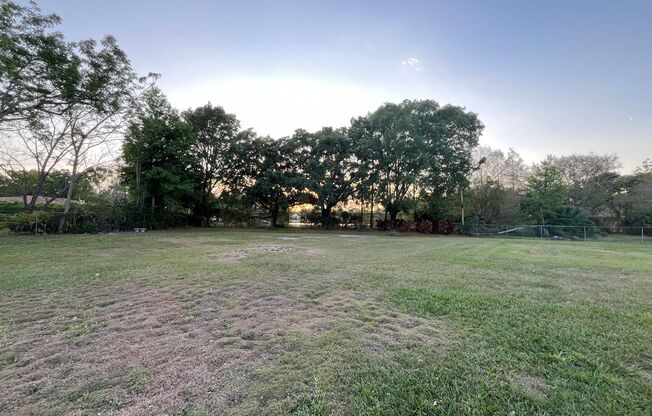 Modern Design 3 bedroom 2 bath home in traditional Orlando neighborhood. HUGE backyard with water views.