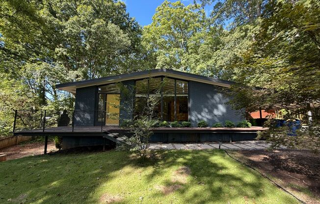 **OFFERING WAIVED APPLICATION FEES & $300 MOVE IN PROMOTION** Luxurious 4BD, 3BA Raleigh Home with Fenced In Yard, Bonus Living Space Downstairs, and in a Prime Location Near NC State, Downtown Raleigh, and Crabtree Valley Mall