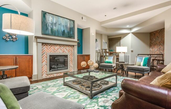 View of Game Room, Showing Poker Table, Chairs, Pool Table, and Café Bar at Alpha Mill Apartments