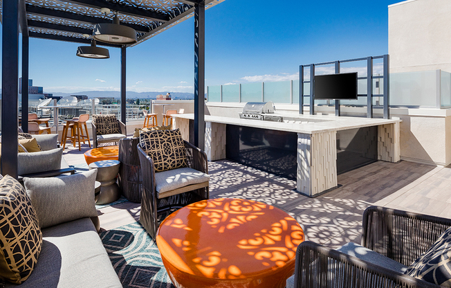 Lush rooftop deck with social seating areas