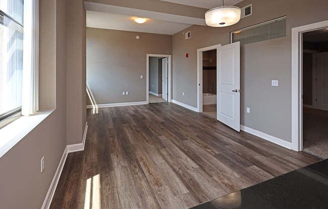 Model Suite with All New LVT Hard Surface Flooring at The Residences at Hanna in Cleveland OH - Living Area