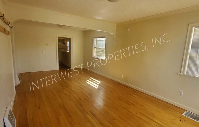SPACIOUS & CHARMING 3BED+BONUS W/ HARDWOODS & FENCED YARD!