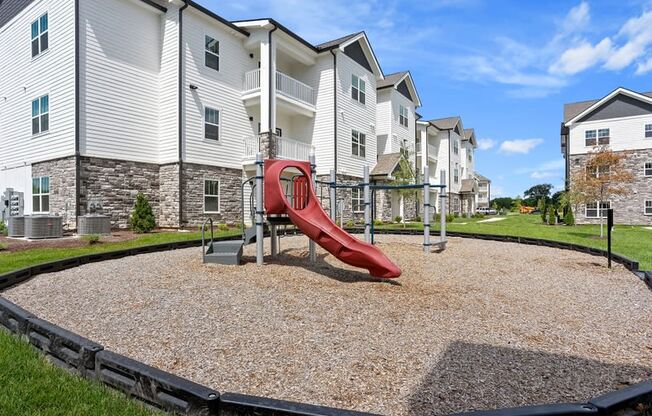 the preserve at ballantyne commons playground with a red slide