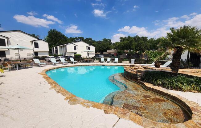 a pool next to a body of water