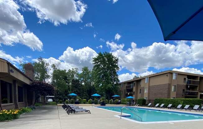 Expansive sundeck at heated pool at Lakeside Village Apartments Clinton Township MI 48038