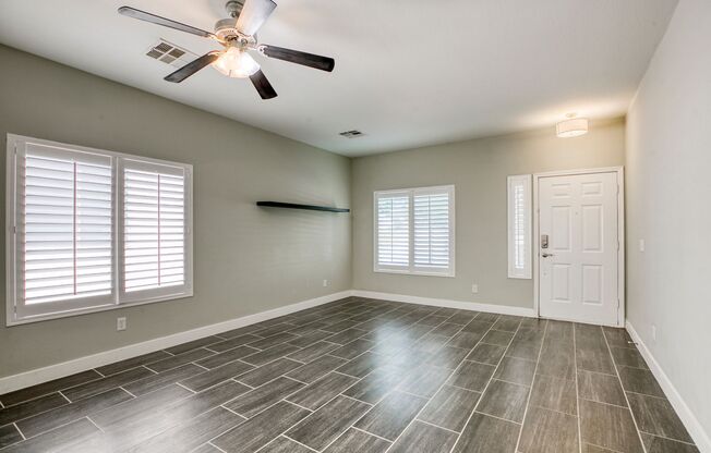 3 Bedrooms Single Story Home with Covered Patio and Lovely Desert Landscaped Backyard
