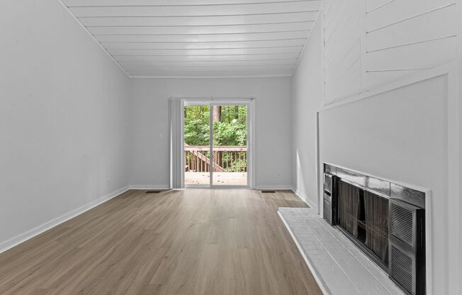 AVAILABLE NOW - Updated 2 Bedroom Duplex w/ Fenced-in Backyard, Large Deck, LVP Floors, Pet Friendly!
