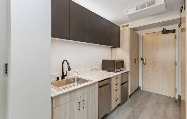 Model kitchen space with dishwasher