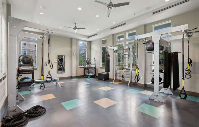 the home gym has plenty of equipment and space to workout